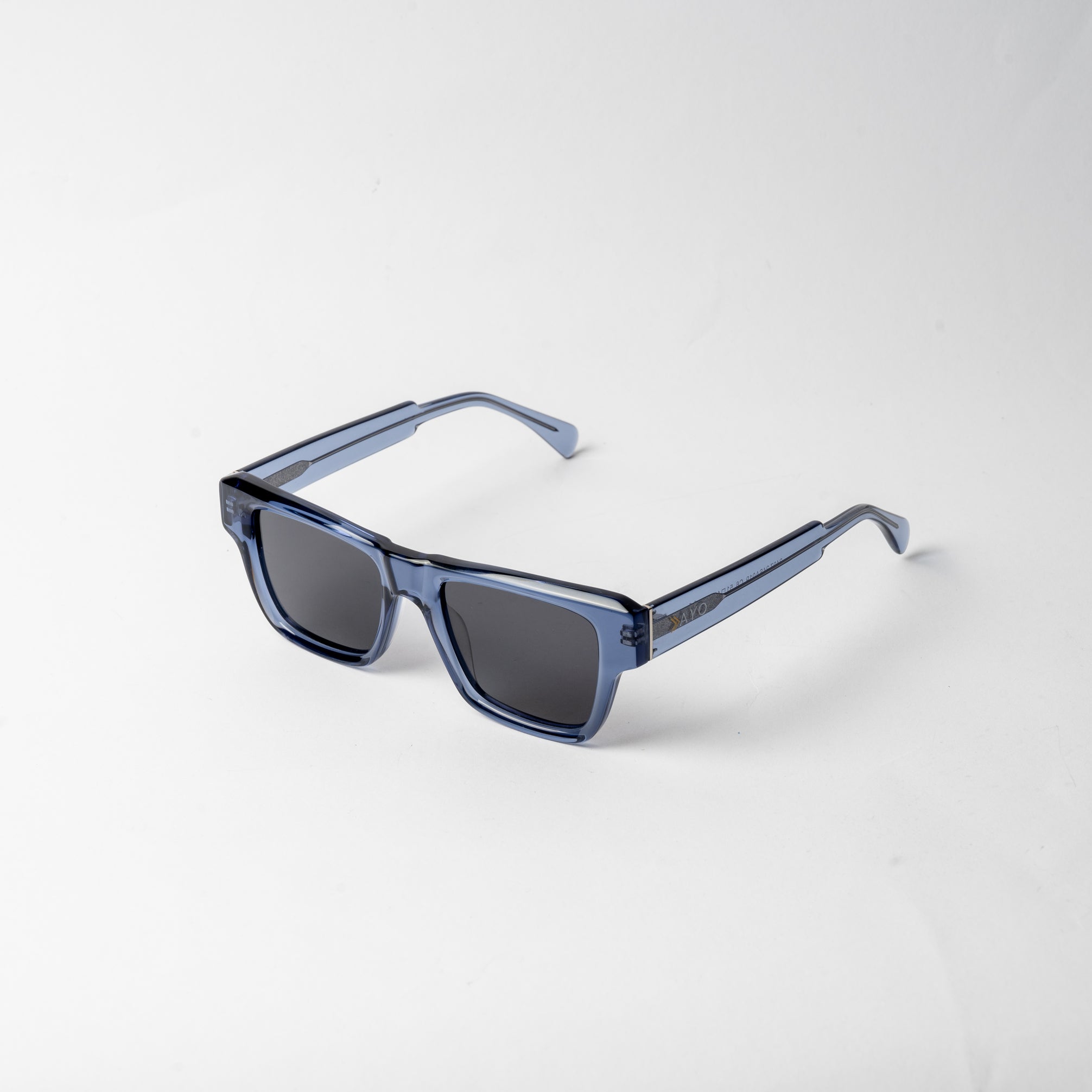Discover the VAYO Ice Blue sunglasses – crafted with a bold blue acetate frame and polarized TAC lenses for superior clarity and style. Unisex design, size 51-19-145. Delivery in 24H across Qatar.